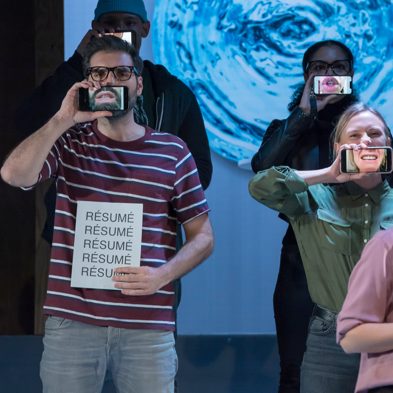 Four people in modern casual clothing stand holding their iPhones in front of their faces with videos of their own mouths playing on the screens. One man holds a paper that says resume on it over and over again.